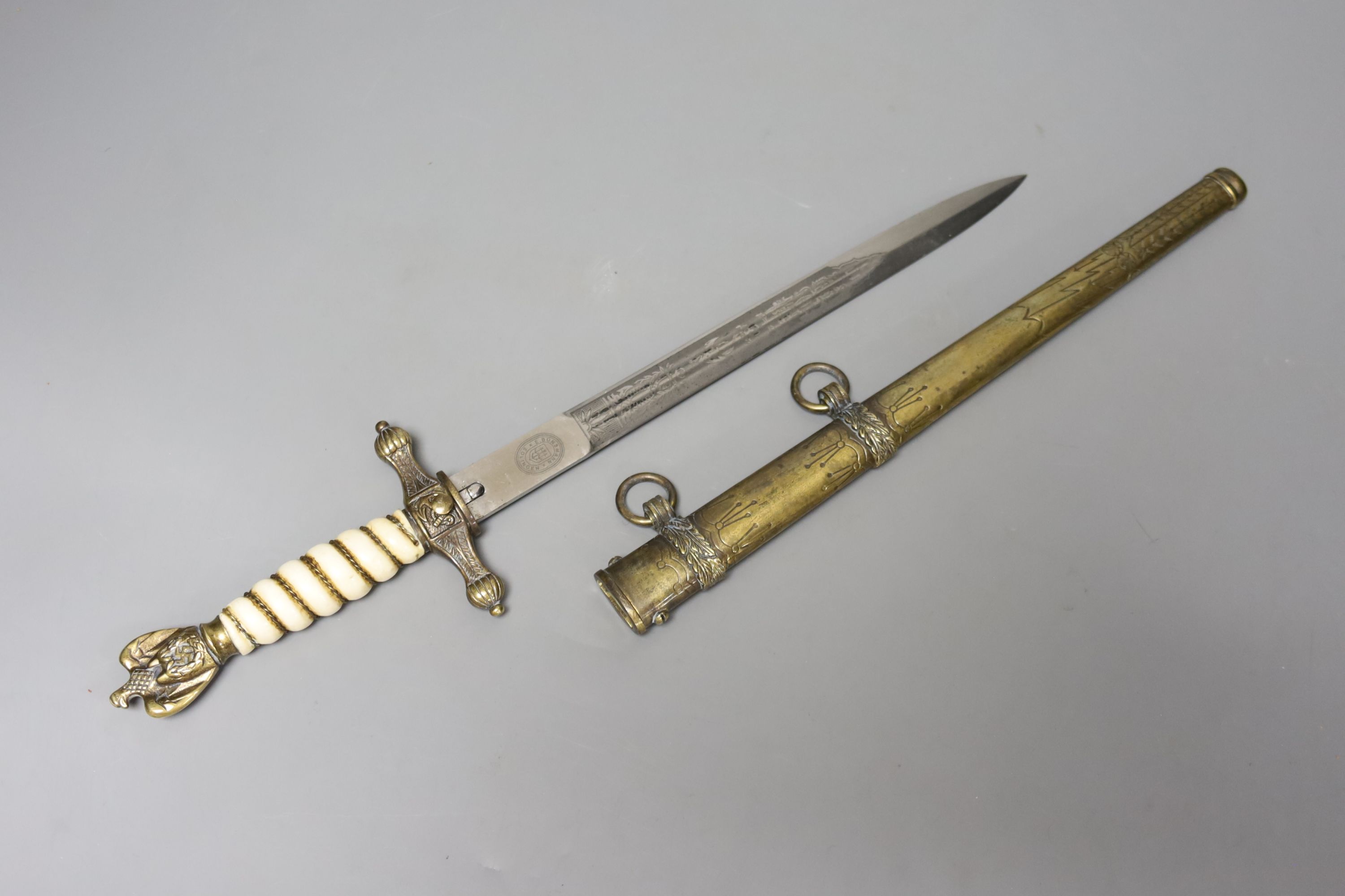 A re-enactors Kreigsmarine dress ceremonial dagger, with brass scabbard, 42cm long